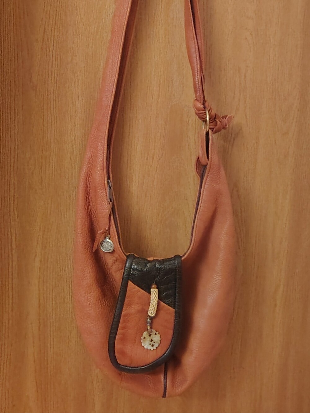 ERDA.     HOBO LEATHER BAG
